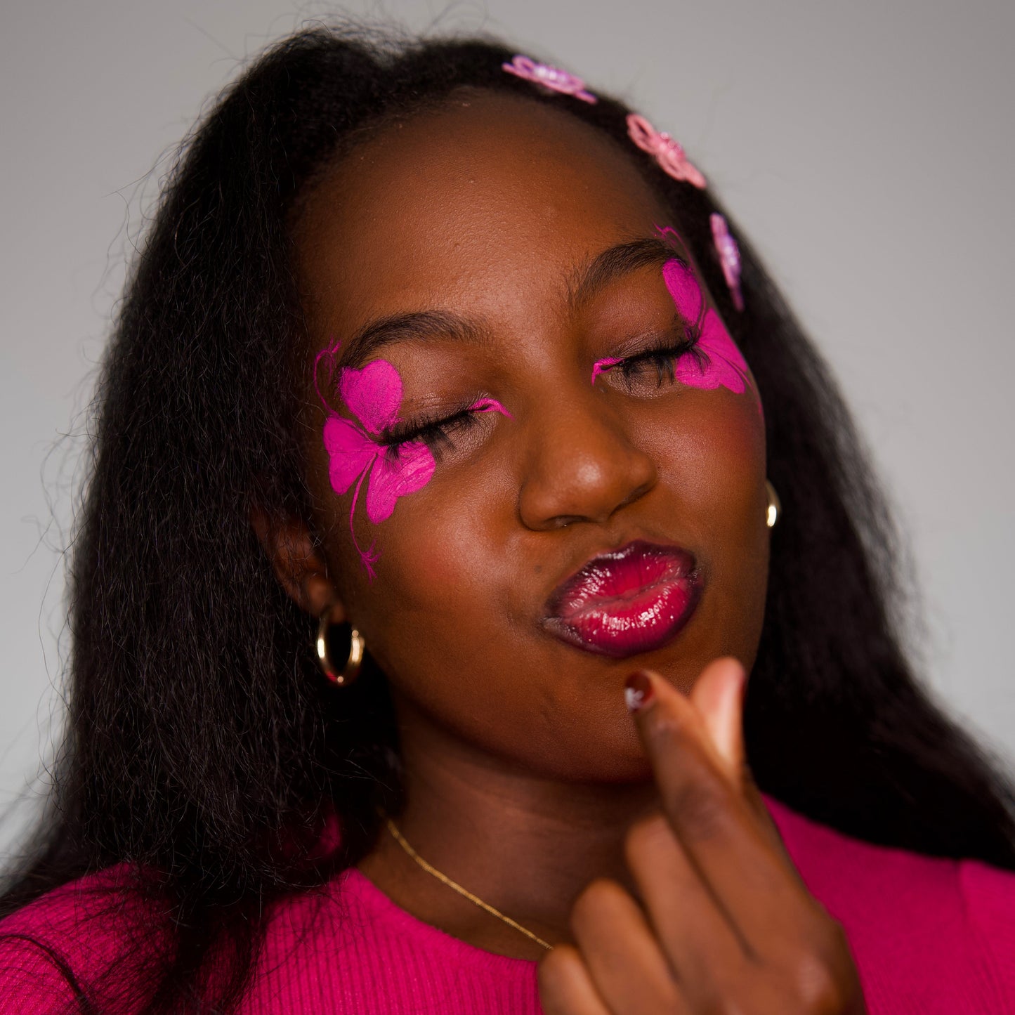 Pink Power Water Activated Liner | Vegan Eyeliner – Noma used for bold butterfly designs on a model's face.